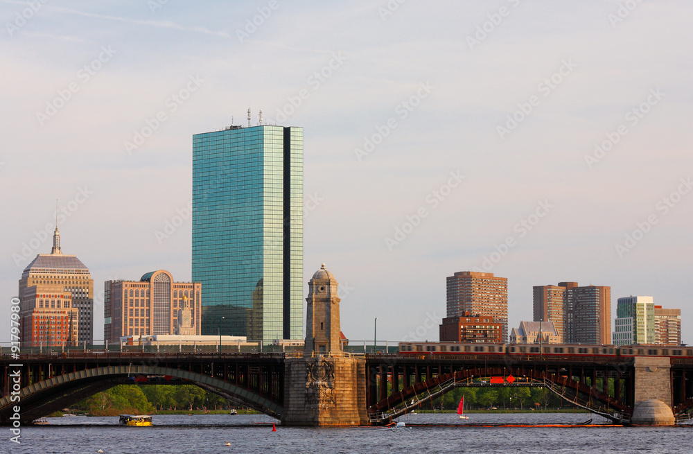 Boston Skyline Showing Charles River and John Hancock Building at Sunset Boston Skyline Showing Charles River and John Hancock Building at Sunset