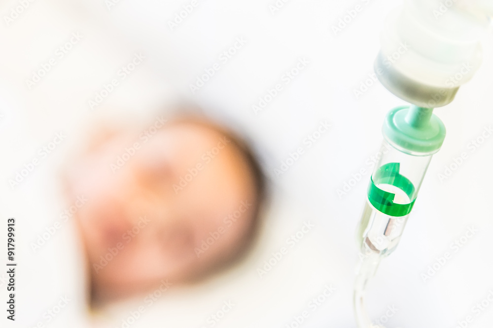 Naklejka premium Selective focus point saline IV drip for patient