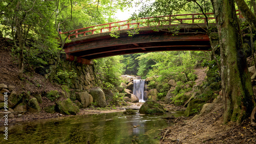 Waterfall and bridge in Japan forest