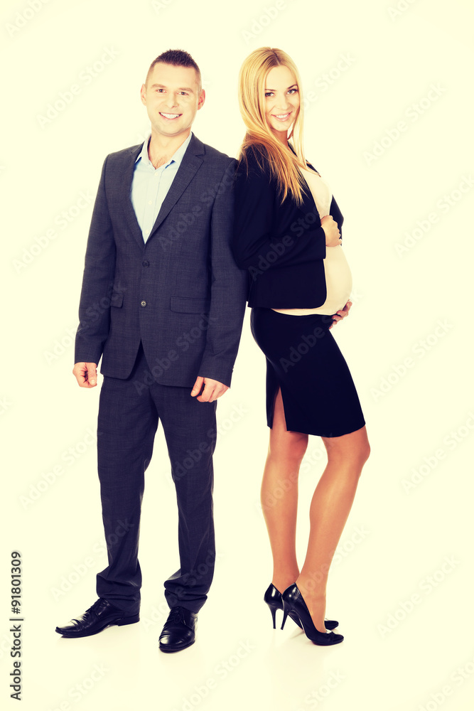 Pregnant businesswoman with her partner Pregnant businesswoman with her partner