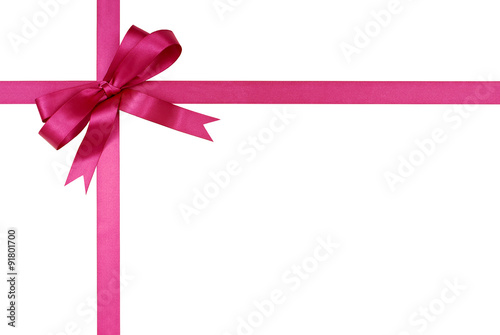 Pink gift ribbon and bow isolated on white background