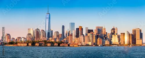 Downtown New York skyline panorama with Ellis Island in the foreground