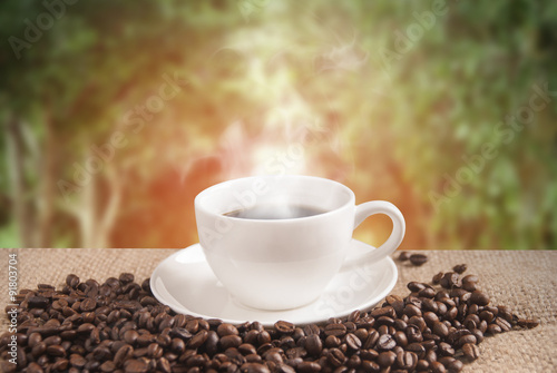 Hot coffee with nature background