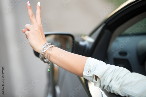 Young driver woman hand