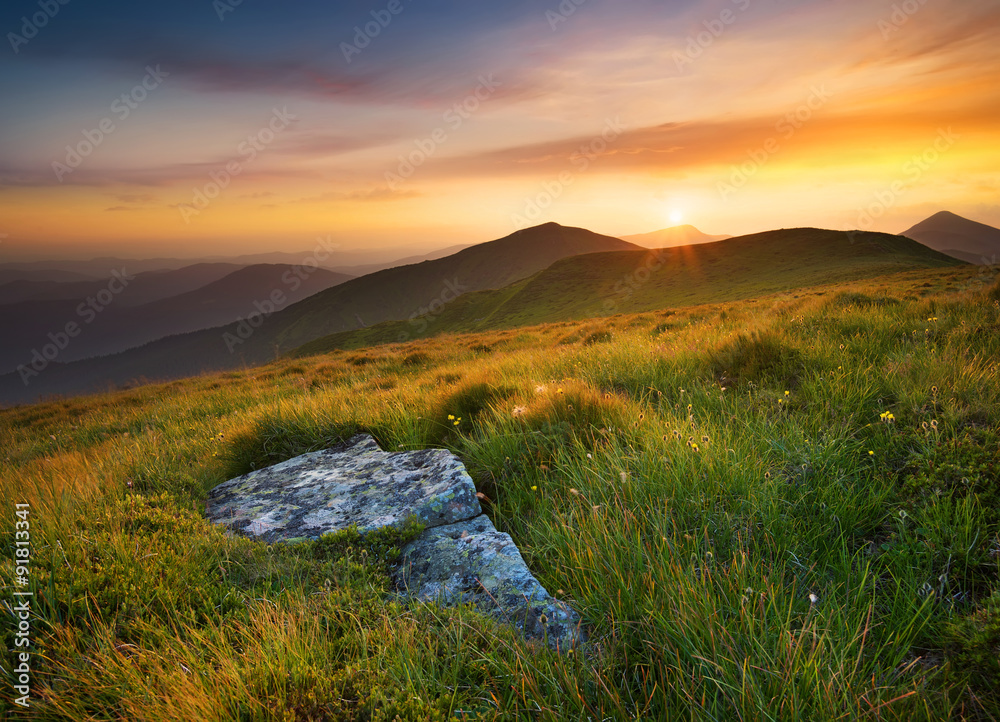 Bright sunset in mountain in summer time. Beautiful natural landscape