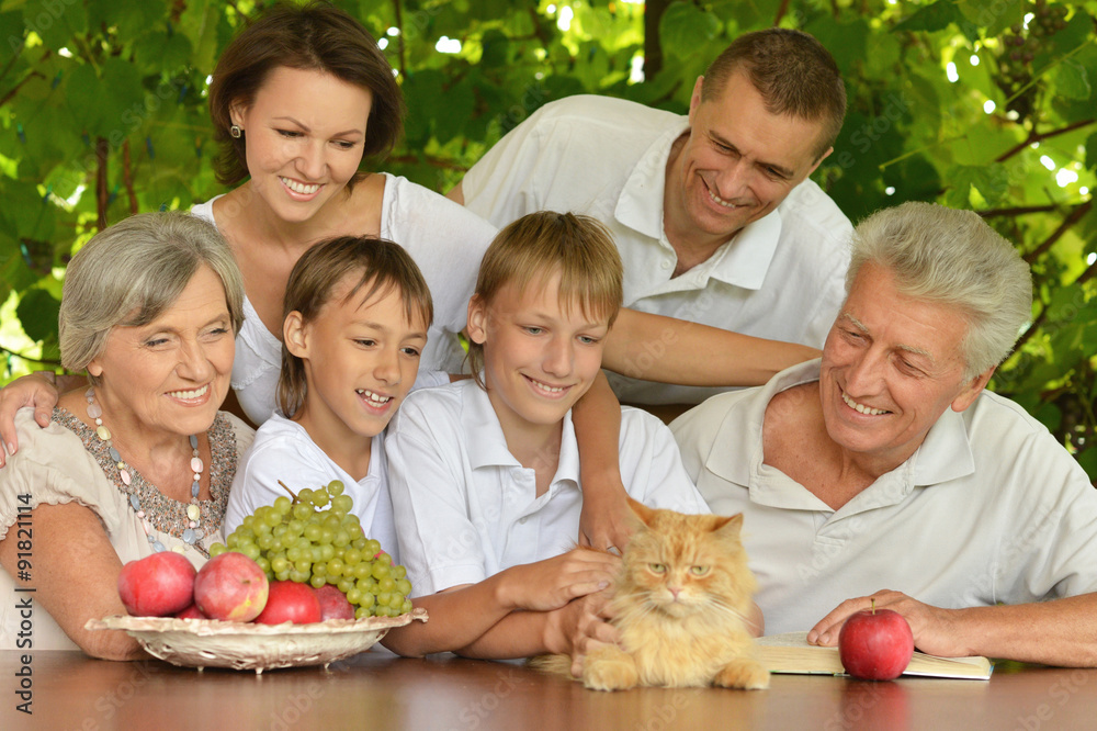 Family eating fruits in summer Family eating fruits in summer