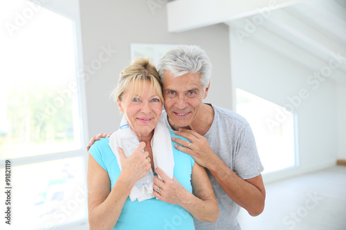 Portrait of senior couple in fitness outfit