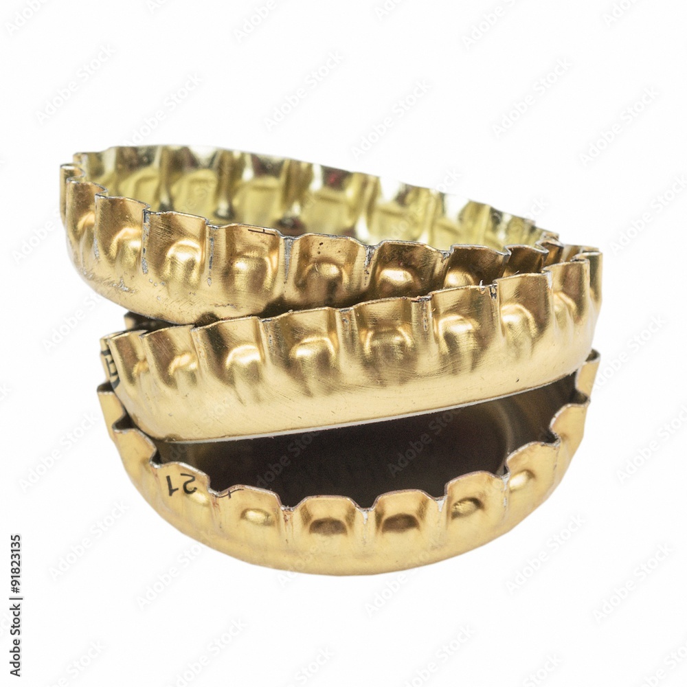 metal corks from bottles isolated on a white background metal corks from bottles isolated on a white background
