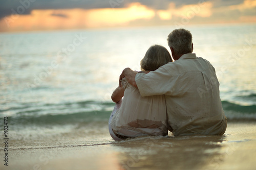 Elderly couple rest at tropical resort