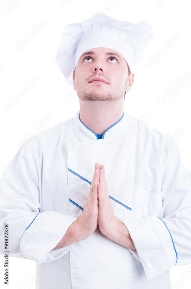 Chef or cook praying and looking up Chef or cook praying and looking up