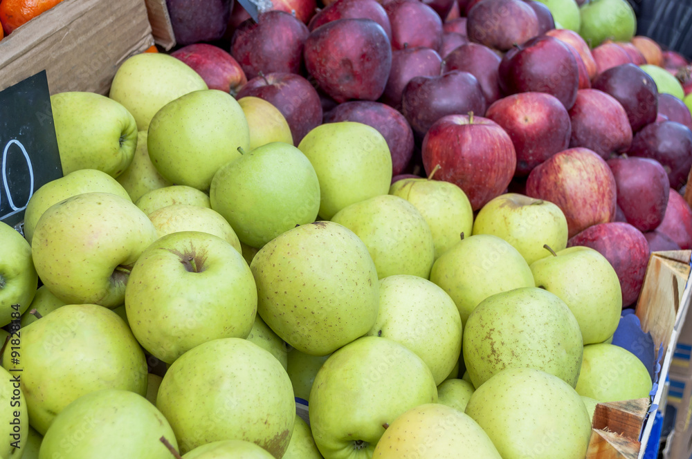Delicious green and purple apples in supermarket Delicious green and purple apples in supermarket