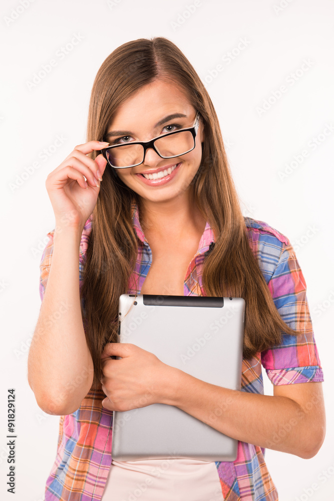 girl in glasses with a digital tablet girl in glasses with a digital tablet
