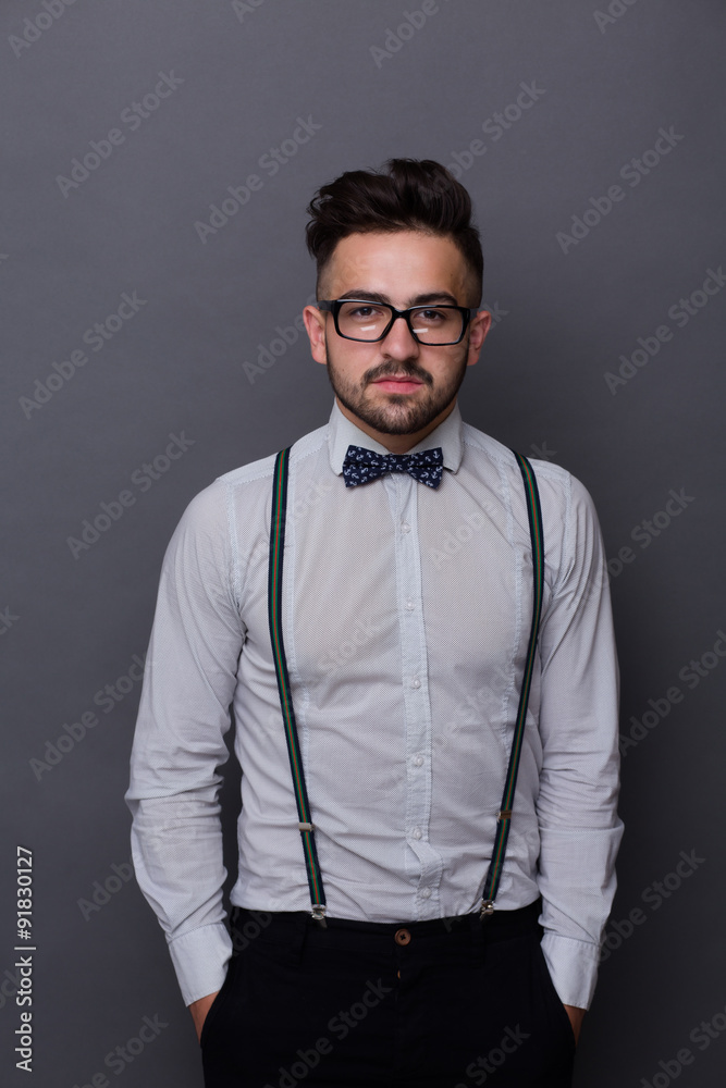 Serious hipster man in studio