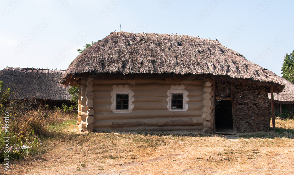 The ancient building of the shed in the garden