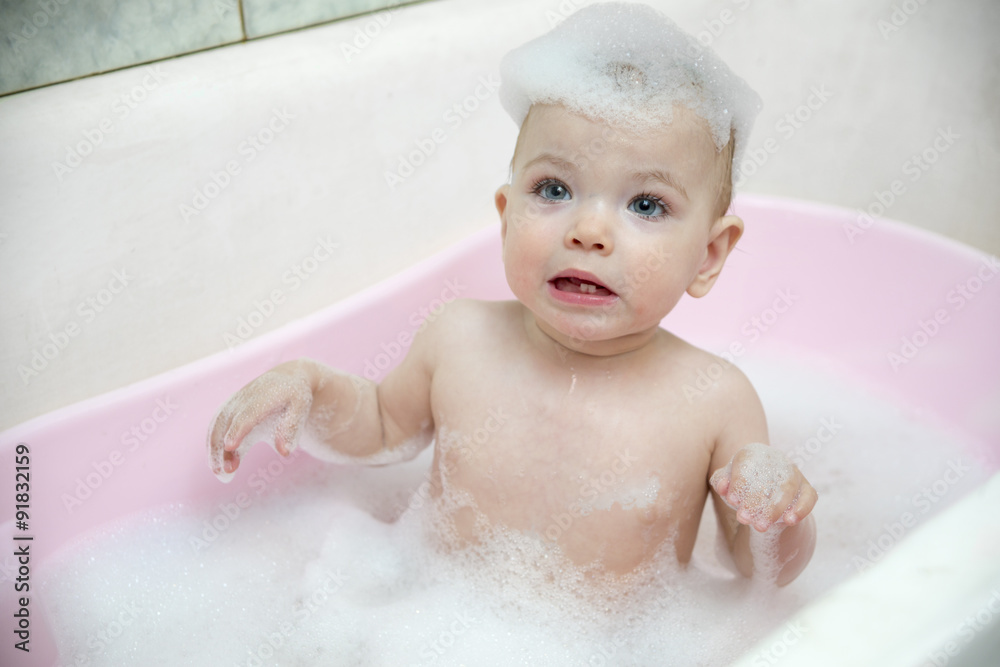girl taking a bath with foam girl taking a bath with foam