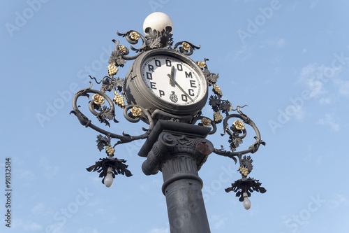 Clock old lamppost on the street, Jerez de la Frontera, Spain