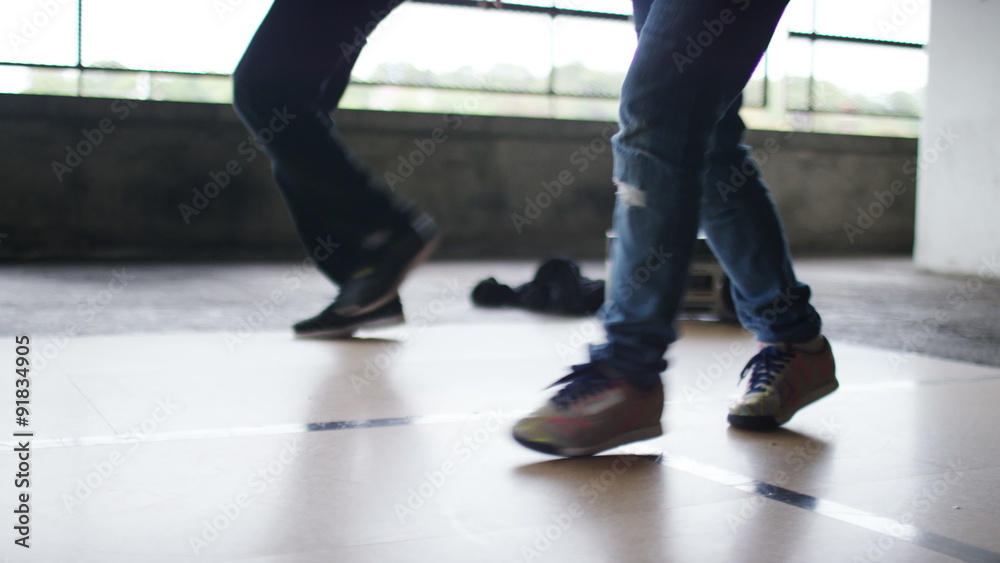 4K Two breakdancers practising a routine together as they dance in sync, in slow motion, shot on Red Epic Dragon 4K Two breakdancers practising a routine together as they dance in sync, in slow motion, shot on Red Epic Dragon