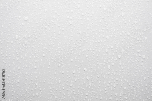 water drop on white surface