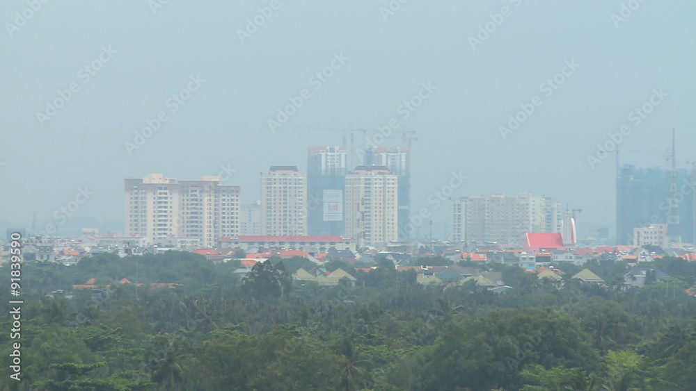 High rise construction telephoto in Saigon suburbs High rise construction telephoto in Saigon suburbs