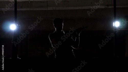 Terrorist With a Rifle Quards Captured Building photo