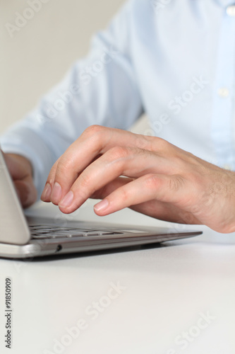 Office manager working with laptop