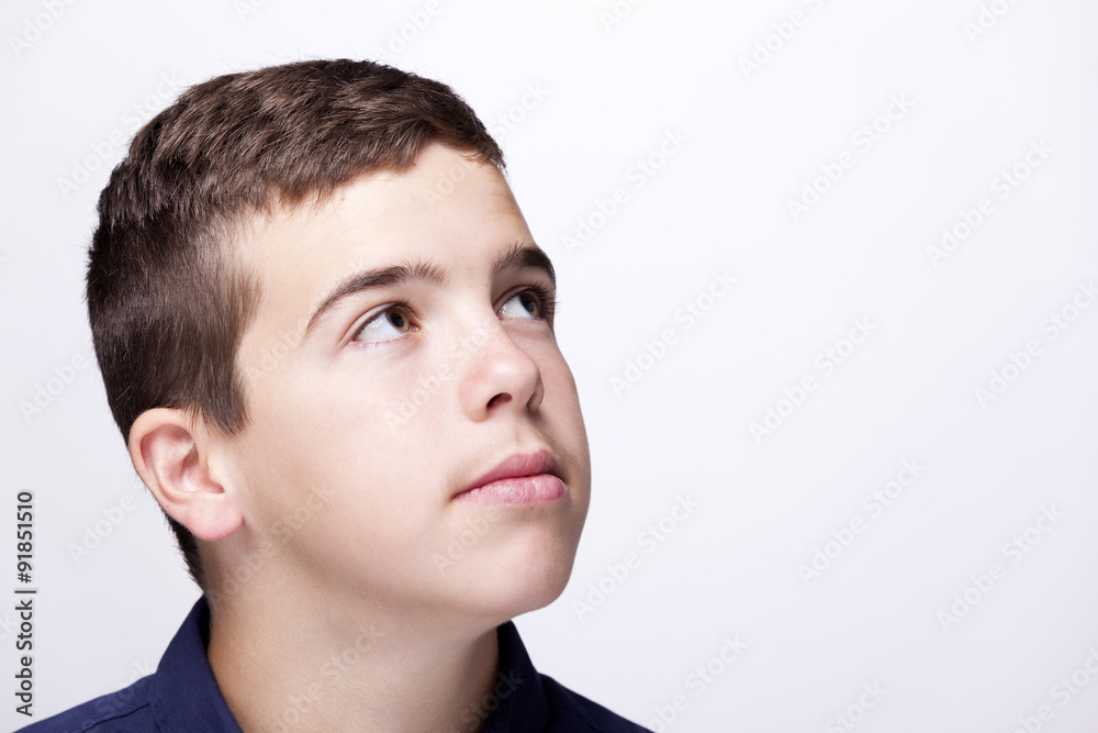 Closeup portrait of a pensive boy Closeup portrait of a pensive boy
