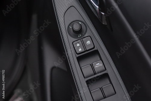 Background of car lock / unlock buttons and window buttons. © twinsterphoto
