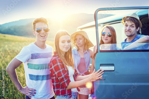 Young hipster friends on road trip