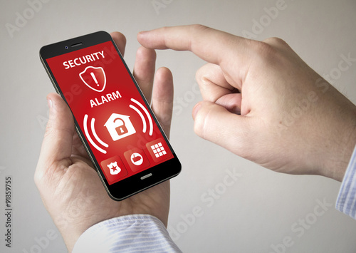  touchscreen smartphone with security alarm on the screen