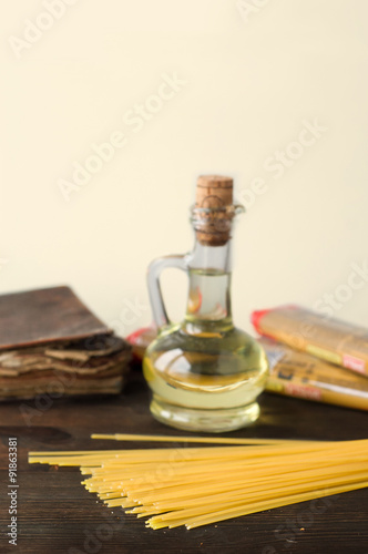 close up of uncooked spaghetti on wood, italin ingredient photo