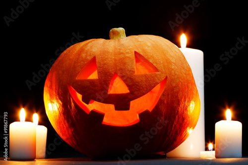 Halloween pumpkin and candles