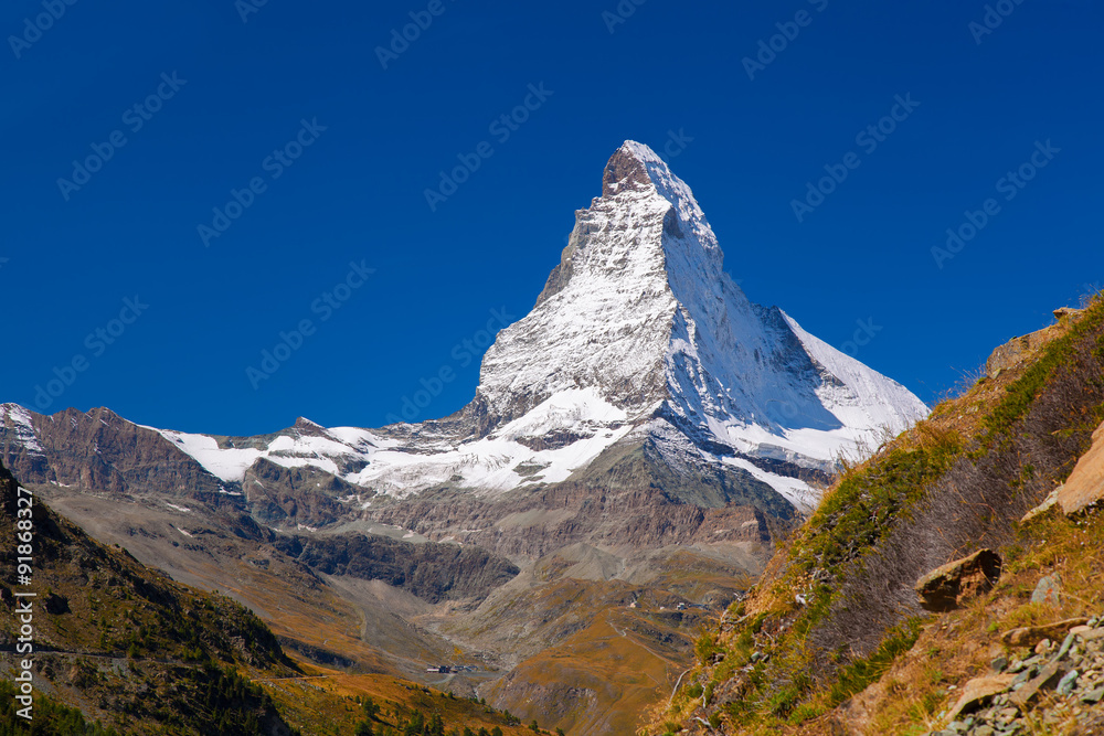 Matterhorn against blue sky in Swiss Alps