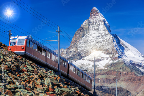 Matterhorn peak with a train in Switzerland 