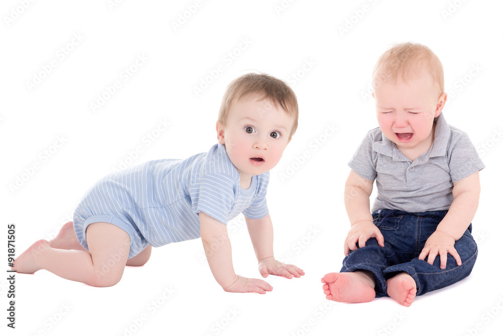 amazed baby boy toddler and his friend crying isolated on white amazed baby boy toddler and his friend crying isolated on white