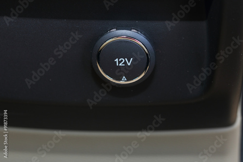 close up of 12V power outlet socket for charger in a car