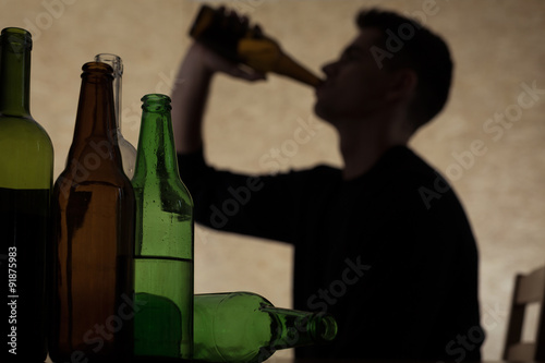 Teenager drinking beer Fototapeta