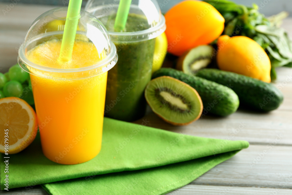 Fresh juice mix fruit, healthy drinks on wooden table, on bright background Fresh juice mix fruit, healthy drinks on wooden table, on bright background