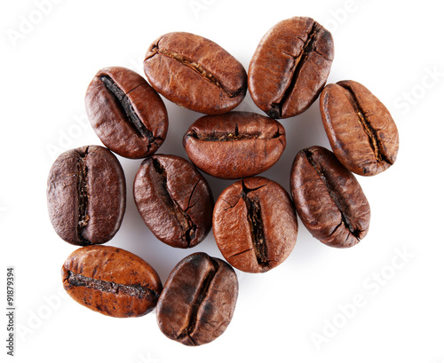 Brown coffee beans isolated on white