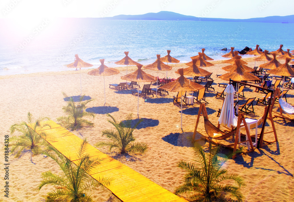 Sunny beach at bulgarian coastline resort - obrazy, fototapety, plakaty 