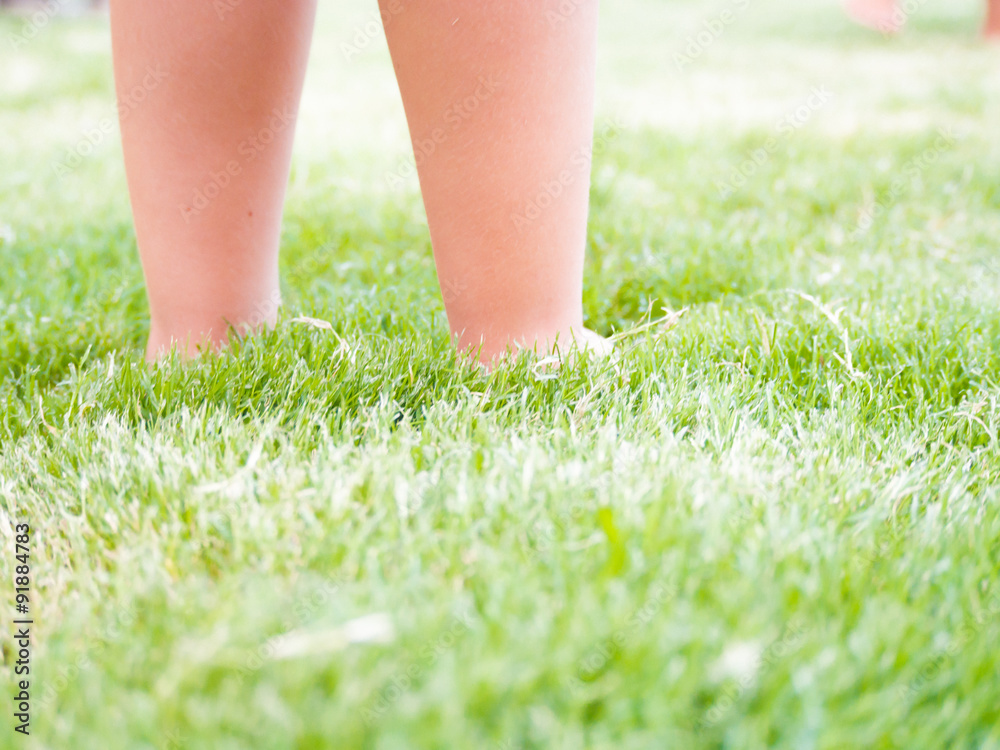 Feet Kid on the grass