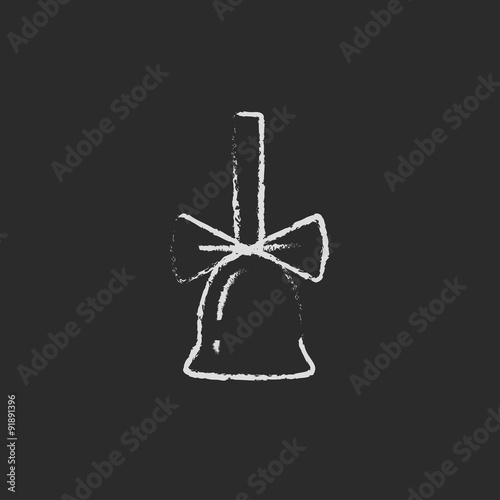 School bell with ribbon icon drawn in chalk.