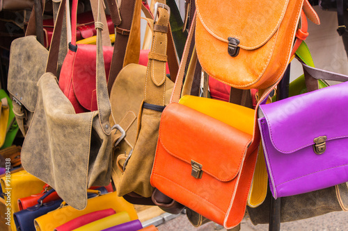 Collection of leather handbags on stall at the bazaar © ratmaner