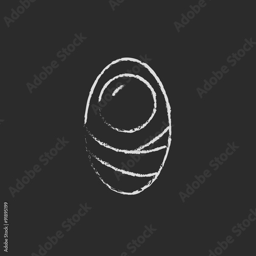 Infant wrapped in swaddling clothes icon drawn chalk.