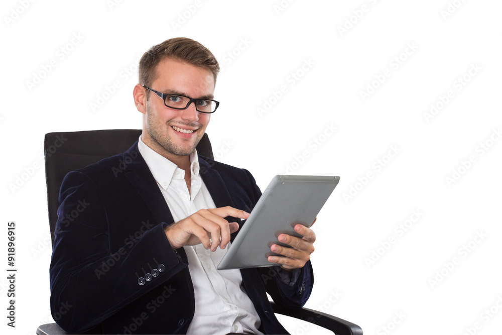 Businessman using a tablet pc, smiling Businessman using a tablet pc, smiling