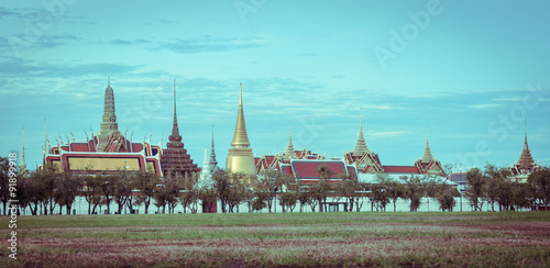 Wat Phra Kaew or Temple of the Emerald Buddha in Bangkok, Thailand. Landmark of Bangkok city in retro filter color image.