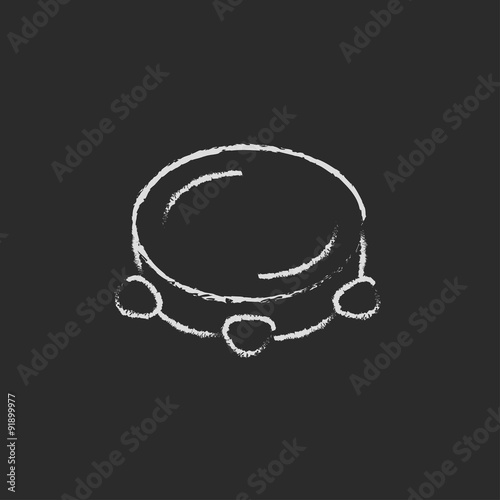 Tambourine icon drawn in chalk.