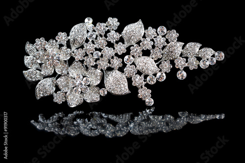 Fotobehang silver brooch with diamonds