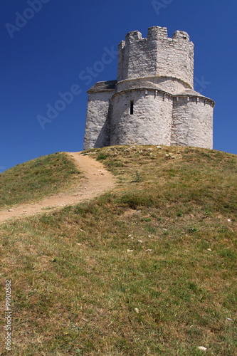 Small church with dirty path