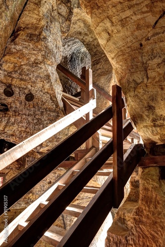 Wooden stairs within rocks