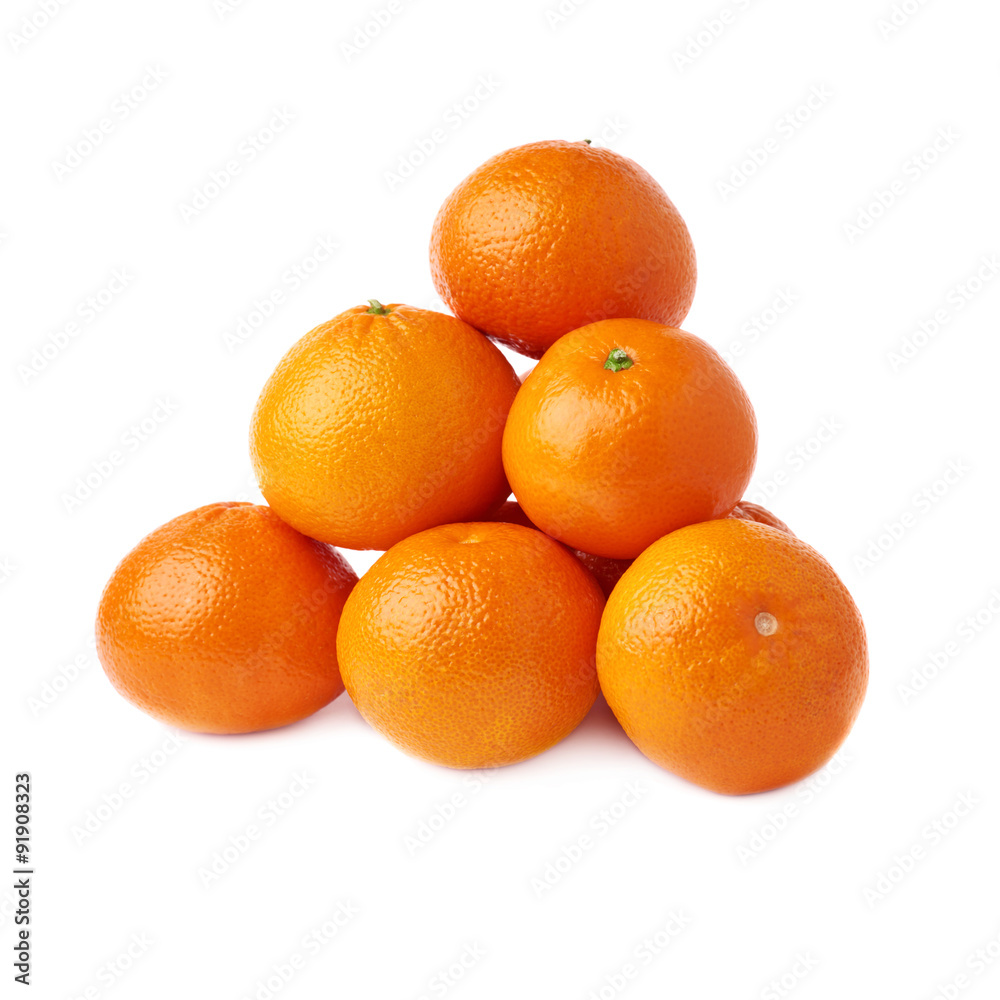 Pile of multiple ripe fresh juicy tangerines, isolated over the Pile of multiple ripe fresh juicy tangerines, isolated over the